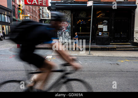 New York, USA - 19 July 2016 - Bicycle commuter on Prince Street in Soho ©Stacy Walsh Rosenstock Stock Photo