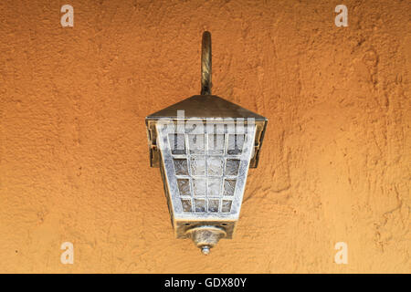 Lamp on brown wall Stock Photo