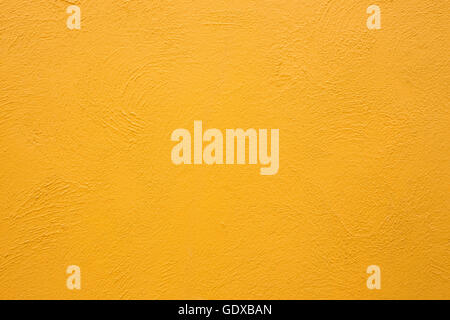 Yellow cement wall Stock Photo