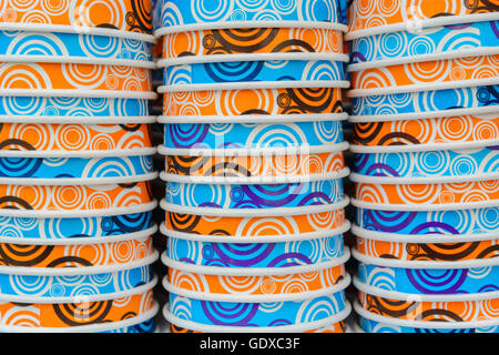 background of colored paper cups stacked Stock Photo
