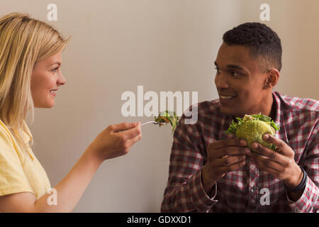Happy couple in vegan restaurant Stock Photo