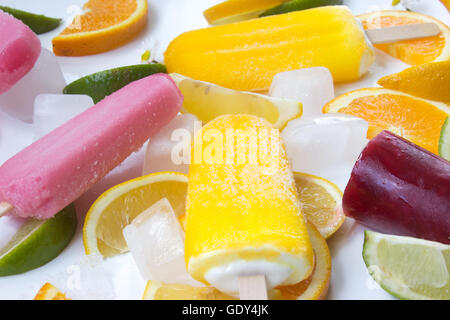 Ice creams with fruit and ice on white background Stock Photo