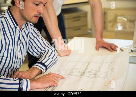 Architects discussing about project in the office, Bavaria, Germany Stock Photo