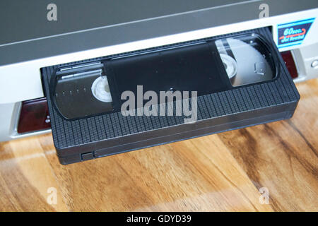 VHS blank casette tape in a VHS player Stock Photo