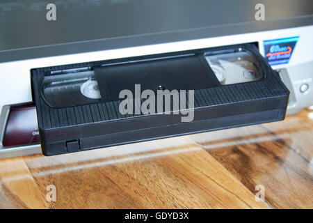 VHS blank cassette tape in a VHS player Stock Photo