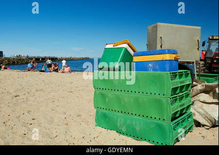 Plastic cases for fish at the fisherboats landingplace -  - Nr. Vorupoer (Nr. Vorupør), Denmark Stock Photo