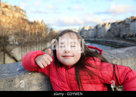 Portrait of little girl smiling in Paris Stock Photo