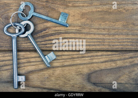 Closeup of keys on wooden table Stock Photo