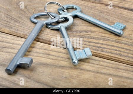 Closeup of keys on wooden table Stock Photo