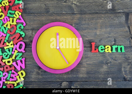 Learn word on wooden table Stock Photo