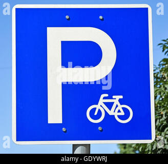 Bicycle parking lot sign in the city Stock Photo