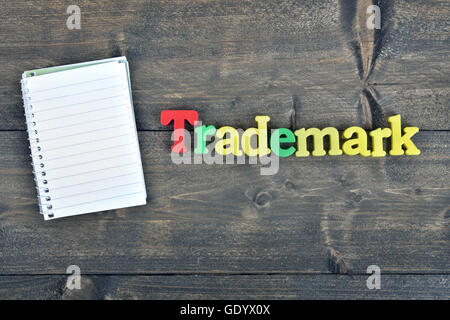 Trademark word on wooden table Stock Photo