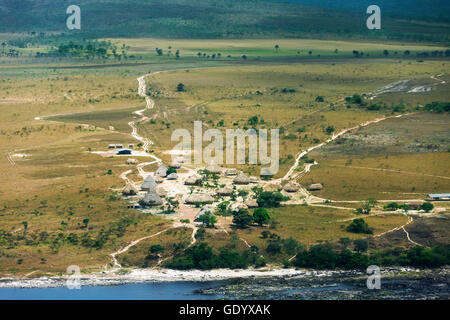 Aerial view of grass huts in village, Canaima National Park, Venezuela Stock Photo