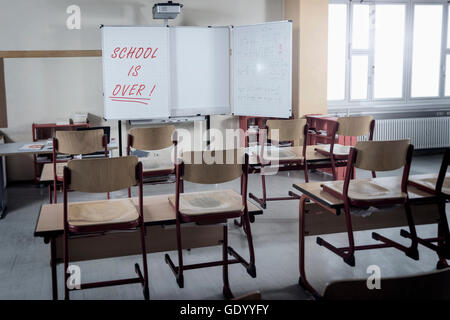 Desks and chairs in empty classroom, Bavaria, Germany Stock Photo