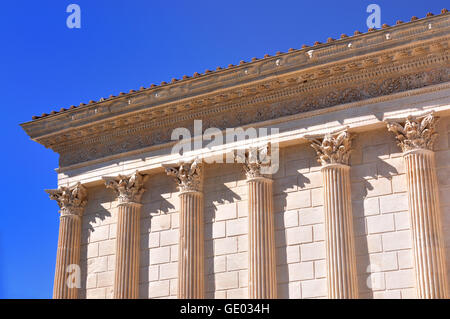 The Maison Carree is an ancient building in Nimes, showing one of the best preserved Roman temple facades. Stock Photo