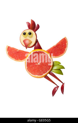 Flying chicken made of grapefruit on white background Stock Photo
