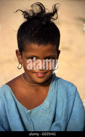 Young Tuareg girl at a Tuareg camp in the Sahara Desert near Timbuktu in Mali, West Africa. Stock Photo