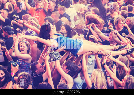 People having fun during concert on the 21th Woodstock Festival Poland. Stock Photo