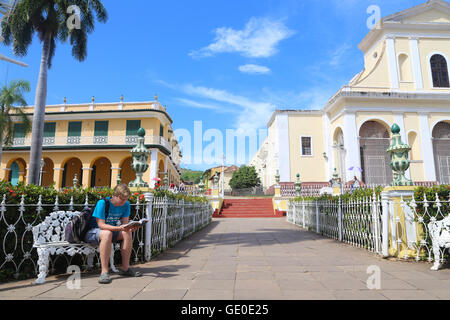 Tourist in Plaza Mayor, Trinidad Cuba Stock Photo