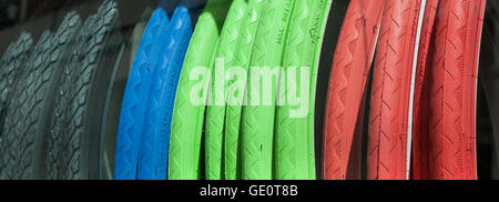 New bicycle tires with different color tread close-up Stock Photo