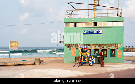 DURBAN, SOUTH AFRICA - AUGUST 17, 2015: Rikshaw at the North Beach lifesaver's station on The Golden Mile promenade Stock Photo