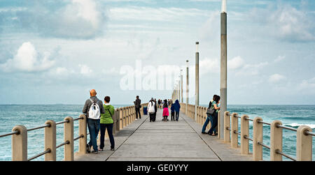 DURBAN, SOUTH AFRICA - AUGUST 17, 2015: People on the pier at North Beach Durban Stock Photo