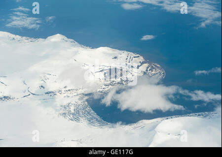Aerial view over snow-capped mountains of Spitsbergen Island, Svalbard Archipelago, Norway Stock Photo
