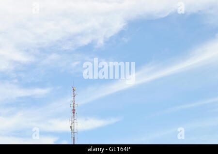 radio pole (telecommunication antenna) on blue sky and soft clouds background Stock Photo
