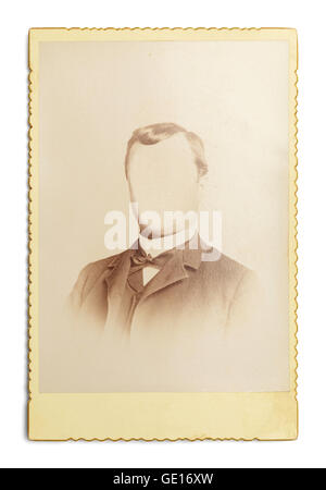 Old Antique Photo of Man With Face Cut Out Isolated on White Background. Stock Photo
