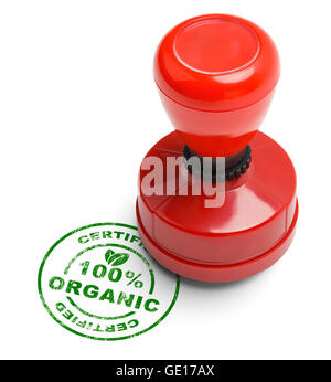 Green 100% Certified Organic Stamp with Wooden Stamper Isolated on White Background. Stock Photo