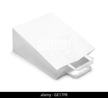 Tipped Over White Paper Bag Isolated on White Background. Stock Photo