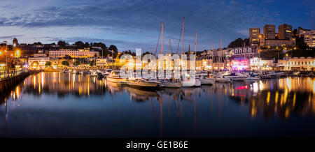 GB - DEVON: Torquay Harbour and Town by night by Edmund Nagele FRPS Stock Photo