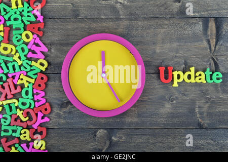 Update word on wooden table Stock Photo