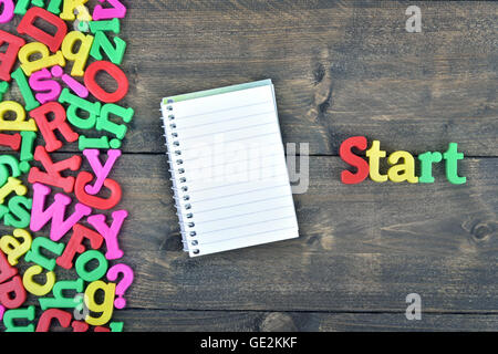 Start word on wooden table Stock Photo