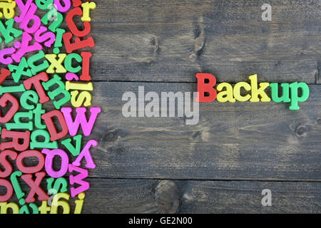 Backup word on wooden table Stock Photo