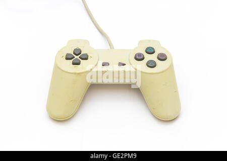 Old white joystick on the white background. video game controller Stock Photo