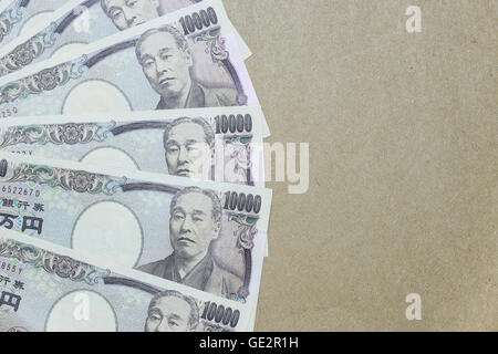 japanese yen on brown paper background Stock Photo