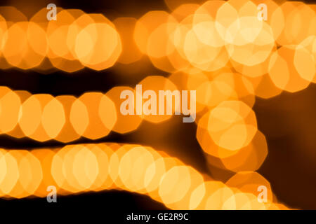 Abstract golden background, circular bokeh, out of focus lights Stock Photo
