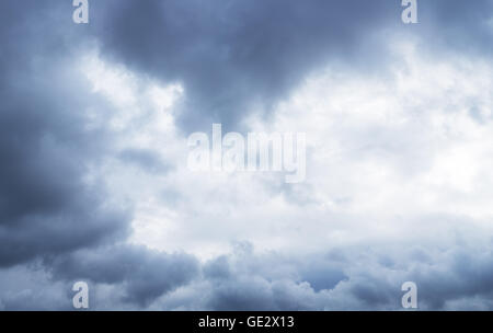 Heavy gray clouds in the sky before snow falling. Stock Photo