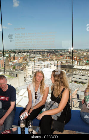 Ireland, Dublin, Ainsfort Street, Guinness Storehouse brewery visitor attraction, visitors in Gravity Bar with panoramic view Stock Photo