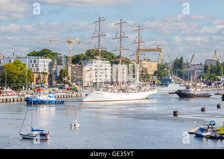 Dar Mlodziezy, one of the biggest ships is about to leave the harbor. Stock Photo