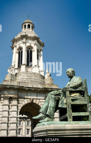 Ireland, Dublin, Trinity College, 1853 Campanile Bell tower & Irish Historian William Edward Hartpole Lecky Statue Stock Photo