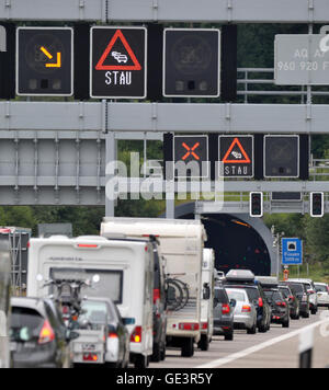 Cars stand in the traffic on the highway A7 at the border tunnel to Austria near Fuessen, Germany, 23 July 2016. PHOTO: STEFAN PUCHNER/dpa Stock Photo