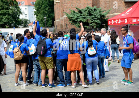 Wroclaw, Poland. 23rd July, 2016. Unidentified group of pilgrims join Days In Dioceses to prepare just before The World Youth Day in Cracow. Pilgrims cheer in front of church on July 23rd 2016 in Wroclaw. Credit:  Bartlomiej Magierowski/Alamy Live News Stock Photo