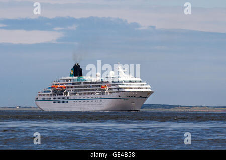 MS Amadea a cruise ship owned by Amadea Shipping Company arrives in the River Mersey heading for the Cruise Terminal in the city centre, Merseyside, UK Stock Photo