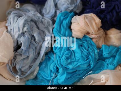 clothing items washed cotton fabric texture with seams, clasps, buttons and  rivets, macro, close-up Stock Photo - Alamy