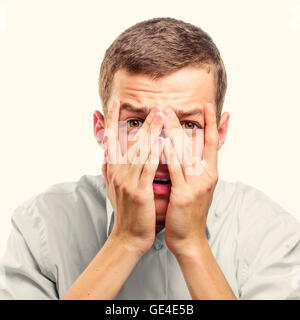 Portrait of amazed or scared man. Toned photo. Stock Photo