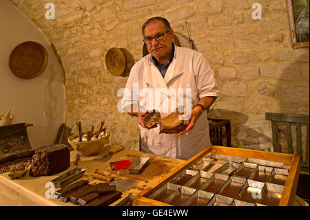 Italy Sicily Modica -  Chocolate Museum - ' Danmmusu ro Ciucculataru ' -ancient laboratory of eighteenth-century work of Modica chocolate - Master Ignazio Iacono - Registered at Rei (Intangible Heritage Register) -Show Cocoa mass Stock Photo