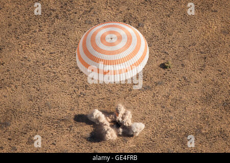 The Soyuz TMA-21 spacecraft is seen as it lands with Expedition 28 Commander Andrey Borisenko, and Flight Engineers Ron Garan, and Alexander Samokutyaev in a remote area outside of the town of Zhezkazgan, Kazakhstan, at 11:59 pm on Thursday, September 15, 2011. (Friday September 16 at the landing location). NASA Astronaut Garan, Russian Cosmonauts Borisenko and Samokutyaev returned from more than five months onboard the International Space Station where they served as members of the Expedition 27 and 28 crews. Photo Credit: (NASA/Bill Ingalls)  Image: 201109160001HQ September 15, 2011 Stock Photo