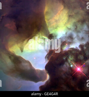 (September 27, 1995) This NASA Hubble Space Telescope (HST) image reveals a pair of one-half light-year long interstellar &quot;twisters,&quot; eerie funnels and twisted-rope structures in the heart of the Lagoon Nebula (Messier 8) which lies 5,000 light-years away in the direction of the constellation Sagittarius. The central hot star, O Herschel 36 (lower right), is the primary source of the ionizing radiation for the brightest region in the nebula, called the Hourglass. Analogous to the spectacular phenomena of Earth tornadoes, the large difference in temperature between the hot surface and Stock Photo